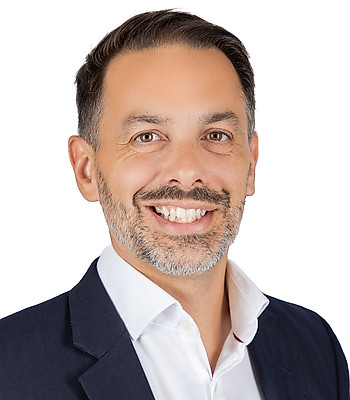Portrait of Alex Thorpe, REALTOR®.